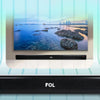 there is a black FS-m235 sound bar of FOL / folntech.us  is placed at the front of television