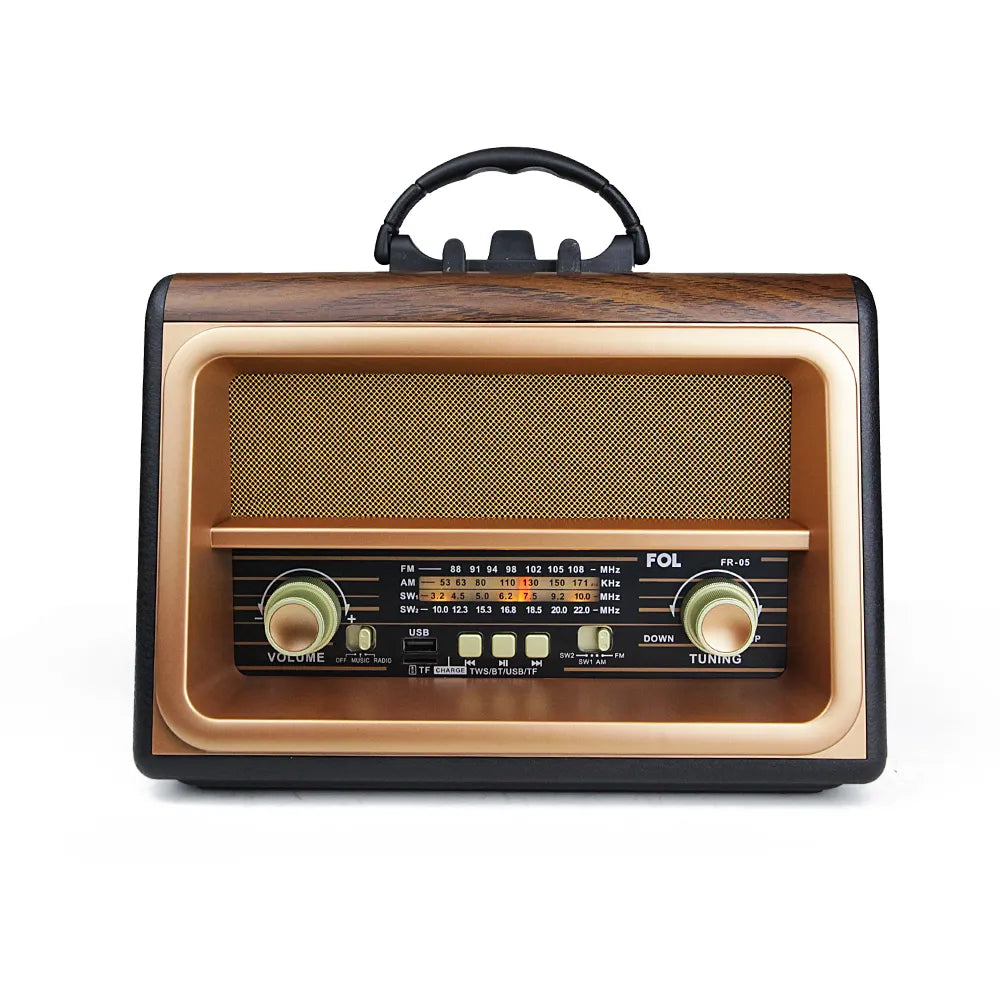 Side view of Portable Radio FR-05, showcasing its wooden finish, black handle, and retractable metal antenna for AM/FM/SW reception.