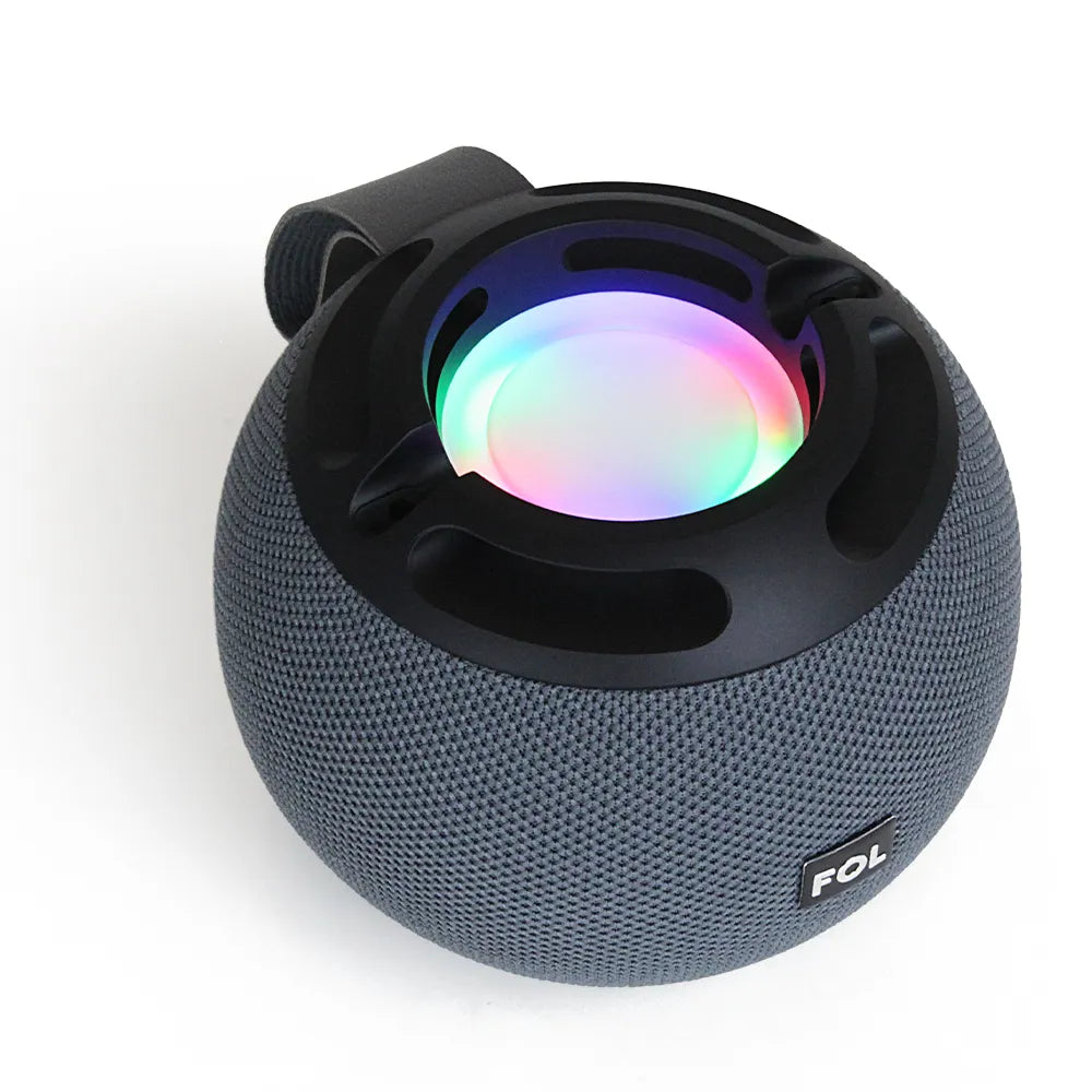A side profile of the gray FOL FS-S985 portable speaker, highlighting the handle and illuminated circular light ring.